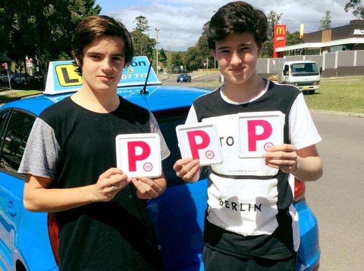 Two teens who are taking defensive driving lessons in Newcastle